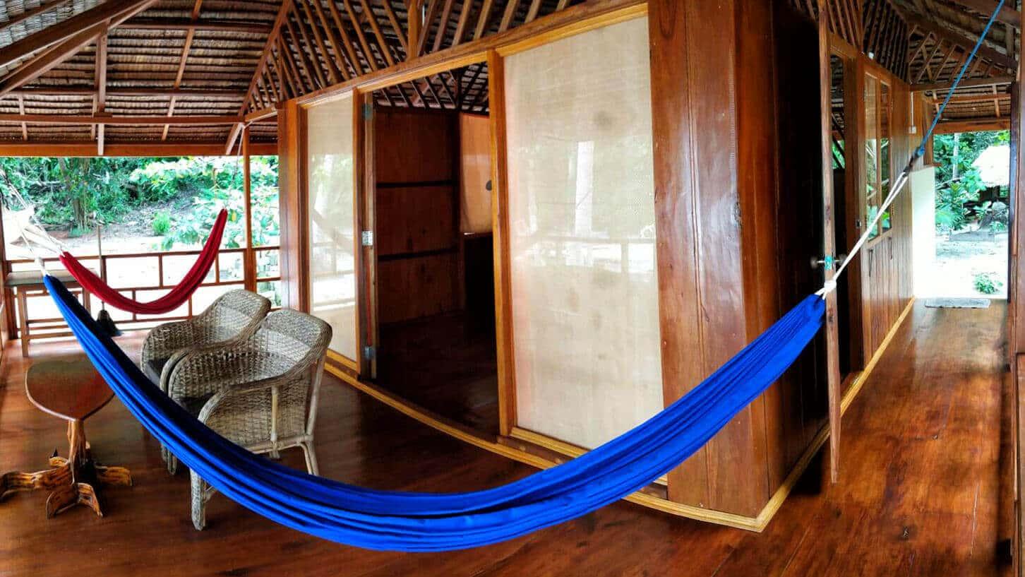 Harmony Bay Resort – Deluxe bungalow interior with king bed