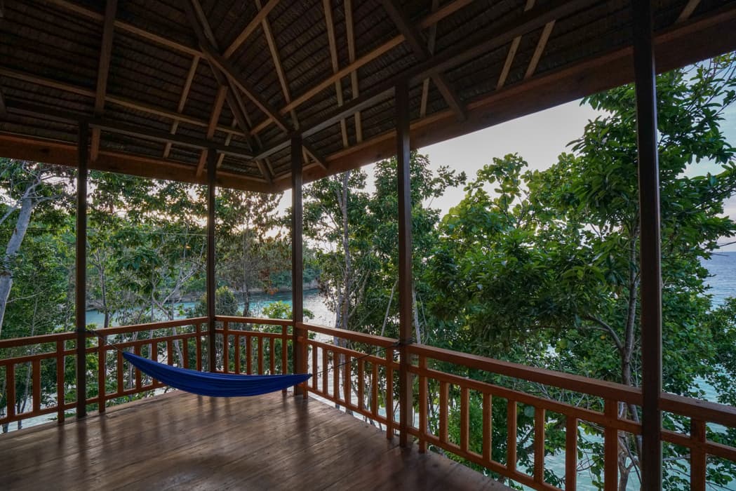 Sifa Diving Resort – veranda hammock overlooking the bay